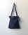 Zipper suede blue tote bag