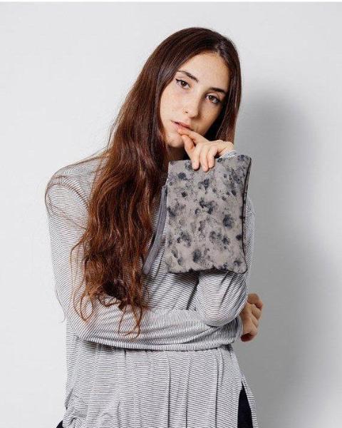 Stains grey clutch bag